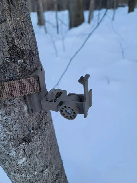 Versatile Trail Camera Mount For Moultrie Edge Models 2 And 3 Solar attached to tree using strap, side view