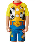 Two Piece Toy Story Boys Rash Guard And Swim Trunks Set With Woody And Buzz Lightyear Graphics Back Zip Rash Vest And Quick Dry Swim Shorts For Ages 3 To 7 The Cool Poolside Beach Day Outfit Loved By Little Fans showing Woody graphics on shorts.
