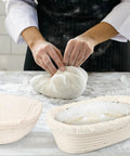 Pro-Grade Sourdough Starter Kit with baker kneading dough and two proofing baskets for easy fermentation and perfect loaves