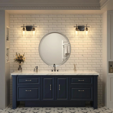Bathroom setting with 2 Light Vanity Light Fixture With Clear Glass Shades And Matte Black Finish over mirror, illuminating space