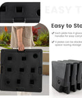 Person holding Fillable Offset Patio Umbrella Base Set For Cantilever Umbrellas with 4 stackable plates and grooved handles.