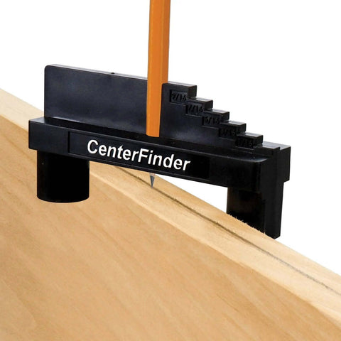 Milescraft CenterFinder front view: black center-scriber tool clamped to wood edge with orange pencil