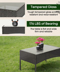 Glass-top table from 4-Piece Outdoor Patio Set In Black Wicker With Coffee Table, Weather-Resistant Rattan Conversation Set for Porch