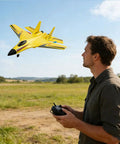 Man flying yellow foam remote control airplane, outdoors. Easy To Fly Foam Remote Control Airplane For Beginners And Adults, 360 Degree Flip Glider Aircraft