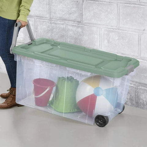 Heavy Duty Rolling Storage Bins, 40 Gallon Capacity, 2 Pack Garage Organization Cart With Wheels, Hella Tough Mobile Container For Moving Supplies, Workshop Tools, And Camping Gear, Green Sage holding toys.