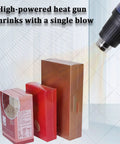 GFJYKDL Professional Shrink Wrap Machine With Heat Gun For Effortless Pvc Pof Pe Film Packaging And Sealing with heat gun and packed boxes.