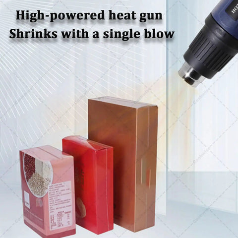 GFJYKDL Professional Shrink Wrap Machine With Heat Gun For Effortless Pvc Pof Pe Film Packaging And Sealing with heat gun and packed boxes.