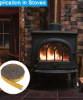 Wood stove front view; black stove with fire, inset shows yellow gasket rope for stove door.