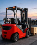 Heavy Duty Electric Forklift Truck With Battery Power For Bulletproof Warehouse Material Handling That Slides Into Any Space While Crushing Pallet Transport Duties And Hauling Heavy Cargo With Ease To Keep Your Distribution Center Running Like Clockwork, parked with crate at sunset.