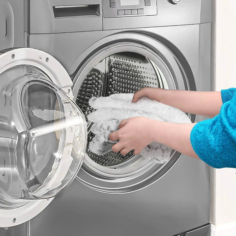 Loading Replacement Steam Mop Pads into washer for Bissell 1940 and 2075, ultra absorbent and reusable anti scratch cleaning pads