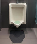 Disposable Urinal Mats With Odor Control, Time Monitor, And Non Slip Adhesive Charcoal Insert, Case Of 6 For Fresh Restrooms shown on floor