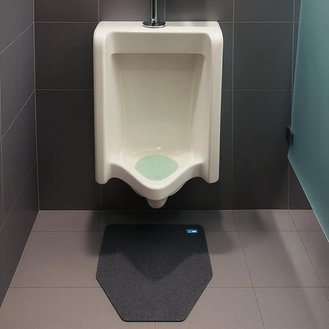 Disposable Urinal Mats With Odor Control, Time Monitor, And Non Slip Adhesive Charcoal Insert, Case Of 6 For Fresh Restrooms shown on floor