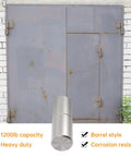 Weldable barrel hinge front view: silver cylindrical hinge in foreground with a gray steel gate behind.