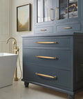 Champagne Bronze Appliance Pull For Large Paneled Cabinets, 18 Inch Center To Center Cabinet Handle, installed on dark blue drawers