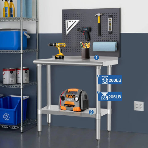 Built Tough Stainless Steel Commercial Work Table 14x30 Inches With Undershelf And 2 Inch Backsplash Heavy Duty NSF 430 Kitchen Prep Station For Restaurants And Food Service in a workshop setup.
