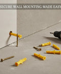 Drywall Anchors And Screws Kit For Hollow Walls, Prepaired Plastic Wall Anchor Set In Yellow on concrete surface with drill