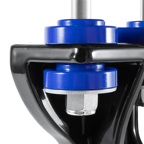 Close-up of Peterbilt 377-379 lower hood pivot kit part with black bracket and blue bushing for smooth hood operation, OEM replacement.