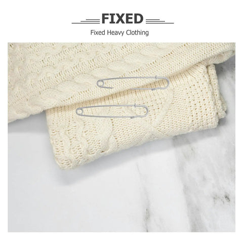 Heavy Duty Safety Pins Set By Adorainbow, 50 Pack Super Strong Iron Brooches For Thick Sweaters And Bags on knitted cream blanket.