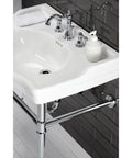 American Classic Widespread Lavatory Faucet In Naples Bronze, 5-5/16 Inch Spout Reach, Deck Mount seen on white sink