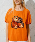 Woman wearing orange shirt with Monkey Vibe DTF Transfers Set For T Shirts Ready To Press Heat Vinyl Stickers 7x7 bold graphics