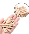 48 Pcs Wood Dowel Pins 8 Mm By 30 Mm And 0.3125 Inch By 1.18 Inch Fluted Beveled Ends Dowels shown in hand