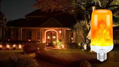 Orange LED Lit Flame Bulbs With Four Modes Indoor Outdoor Use 3W E26 E27 2 Pack illuminating a house at night