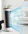Air purifier in a living room emitting clean air with a visible flexible duct attachment.