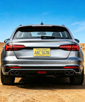 Crystal Clear License Plate Cover For Cars Bubble Shield High Visibility Tag Protector on a silver sedan rear view