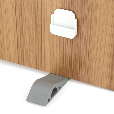 Door Stopper Wedge Set Four Pack Soft TPR Rubber Stoppers holding a wooden door open, showcasing durable non-slip design.