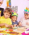 Children crafting with Dope 6 Piece Circle Punch Set For Scrapbooking And Crafts; focus on colorful hairbands and sticker papers.
