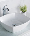 Elavo Square Vessel Sink In White Porcelain Ceramic For Bathrooms, 16.5 Inch, Easy Clean, No-Fuss Maintenance, Scratch-Resistant Glossy Finish, Installation-Ready Bathroom Basin KCV-126 on countertop with faucet