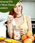 40 Oz Glass Blending Cup For Immersion Blenders With Dual Sealed Lids in use for smoothie blending with fruits.