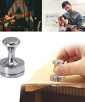 Acoustic Guitar Panel Repair Magnet With Handle For Cracked Panel Fixes shown in hand usage scenario