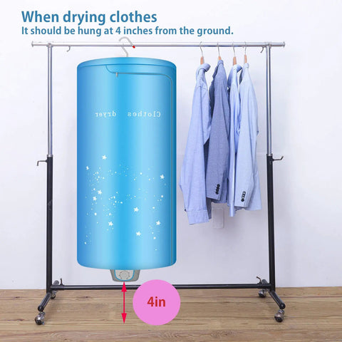 Blue Portable 900W Mini Electric Clothes Dryer Rack For Apartments And Travel Ready next to hanging shirts