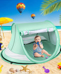 Baby sitting inside Large Pop Up Baby Beach Tent With Mosquito Net Portable Sun Shade For Travel And Indoor Play Kid Friendly Easy Setup Spacious 54 By 35 By 26 Inch Design UPF 50 Plus UV Protection No Fuss Portable Shelter