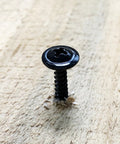 Three Hundred Piece Number Eight By One Inch Truss Head Wood Screws Featuring Self Tapping Zinc Plated Steel And Matte Black Finish in wood.