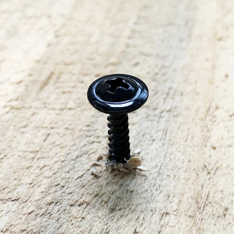Three Hundred Piece Number Eight By One Inch Truss Head Wood Screws Featuring Self Tapping Zinc Plated Steel And Matte Black Finish in wood.