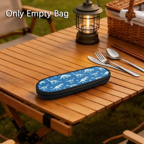 Blue Dinosaur Themed Portable Utensil Kit With Zipper Pouch Reusable Storage Case on wooden table next to cutlery.