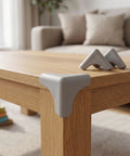 Soft Silicone Corner Protectors With Self Adhesive Edge Covers For Tables Desks And Kitchen Cabinets Protect Kids And Pets From Sharp Edges Rugged Yet Gentle Guard That Prevents Bumps And Injuries In Grey on table