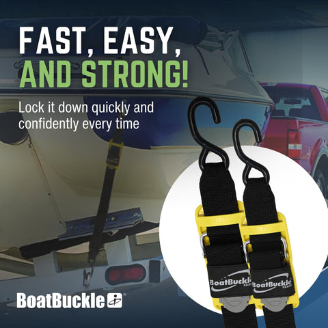 Close-up of Pro Series Kwik Lok Transom Boat Tie Down Straps 2 Pack 2 Inch By 4 Foot Adjustable With Boat Pads in use with trailer.