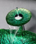 Slick Tempered Glass Vessel Sink Lotus Leaf Countertop Basin Featuring Smooth Waterfall Flow with clear water pouring.
