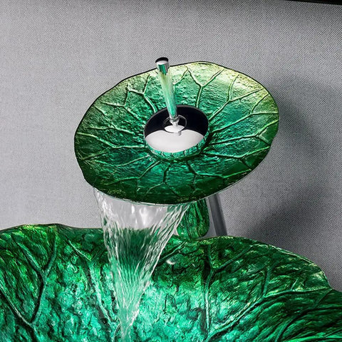 Modern Lotus Leaf Vessel Sink Solid Tempered Glass Countertop Basin with green design and water flow from faucet.