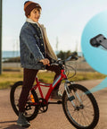 Child riding bicycle with Bike Sound Maker Exhaust System That Lets Your Bicycle Roar Like A Motorcycle Realistic Engine Noise Snap In Install No Tools Needed Four Piece Black Set For Quick Dope Ride Upgrade shown in the image inset