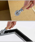 Double End Box Scoring Tool With Dual Rollers For Cardboard And Metal Sheets, shown creasing cardboard and mesh surface.