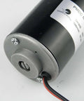 Close-up of a 12V High Speed Permanent Magnet DC Motor 3500RPM Reversible CW CCW Low Noise with all metal construction and dual threaded outlet.