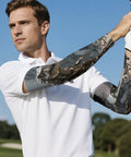 Man wearing Stay Fly In The Heat Cooling Arm Sleeves For Sun Ray Blocking and Summer Workouts, showcasing stretchy ice silk material.