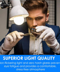 Person examining object under lamp with Bright 10W LED A19 Bulb 1200 Lumen 2700K Soft White Non Dimmable E26 Base 120V