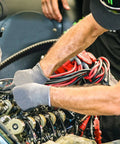 Mechanic installing Five Sixteenth Inch Fuel Line Hose For Cars And Trucks, SAE 30R10, Five Feet Long, High Pressure NBR Rubber