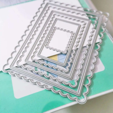 Rectangle Frame Metal Die Cuts Set With Scalloped Edges And Stitched Nesting Tags for DIY paper crafts on table