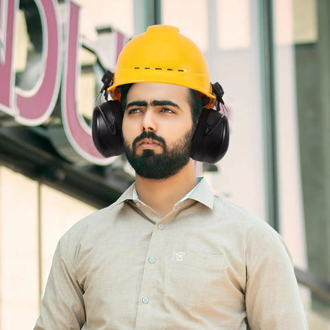 Beefed Up Heavy Duty Safety Hard Hat Earmuffs With Zero Hassle Adjustable Fit And Deep Noise Cancelling Seals For Crews Knocking Out Loud Job Site Projects worn by man in yellow hard hat.
